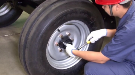 拖拉机前轮毂轴承轴向游隙调整方法